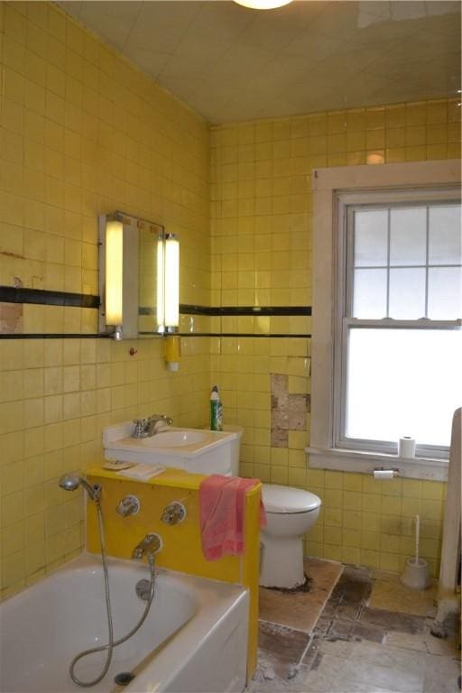 117 Grant Ave, Shaler, PA 15223 - full bathroom with tile walls, a tub to relax in, and toilet