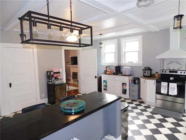 508 Bosses Row, Crucible, PA 15325 - kitchen featuring stainless steel range with electric cooktop, beamed ceiling, light flooring, dark countertops, and white cabinets