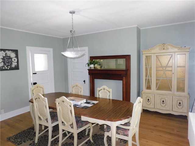 508 Bosses Row, Crucible, PA 15325 - dining space featuring wood finished floors, crown molding, baseboards, and a chandelier