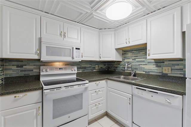 595 Calais Dr Unit 324, Mccandless, PA 15237 - kitchen with white appliances, a sink, dark countertops, and white cabinetry