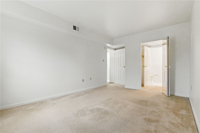 595 Calais Dr Unit 324, Mccandless, PA 15237 - unfurnished bedroom with light carpet, baseboards, and connected bathroom
