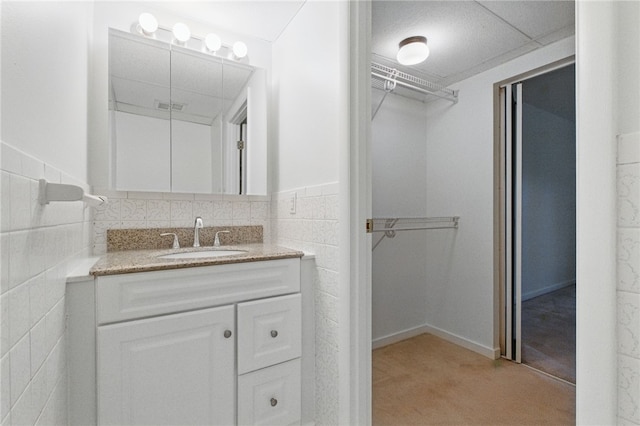 595 Calais Dr Unit 324, Mccandless, PA 15237 - bathroom featuring vanity and a spacious closet