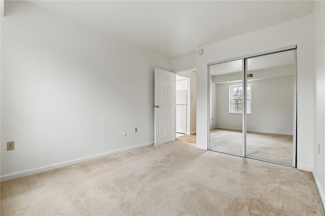 595 Calais Dr Unit 324, Mccandless, PA 15237 - unfurnished bedroom featuring carpet flooring, baseboards, and a closet