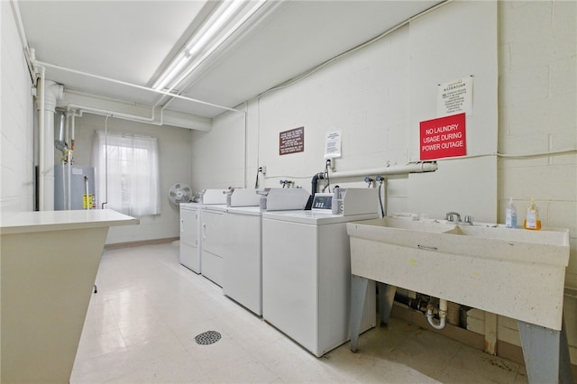 595 Calais Dr Unit 324, Mccandless, PA 15237 - shared laundry room with washing machine and clothes dryer and water heater