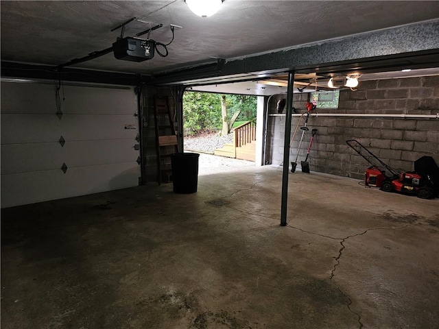 728 Heathergate, Indiana Twp Nal, PA 15238 - garage featuring a garage door opener and concrete block wall