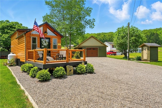 319 Ferry Ln, North-Other Area, PA 16370 - view of play area featuring an outbuilding and a deck