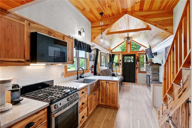 319 Ferry Ln, North-Other Area, PA 16370 - kitchen with black microwave, gas range, a sink, light wood-style flooring, and wooden ceiling