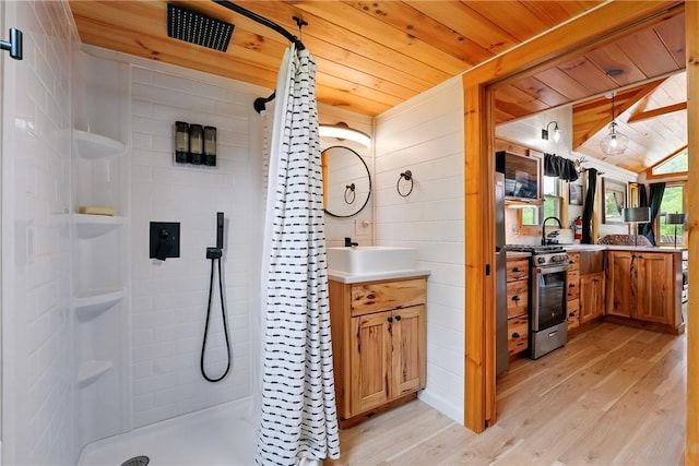 319 Ferry Ln, North-Other Area, PA 16370 - bathroom with wooden ceiling, wood finished floors, curtained shower, vaulted ceiling, and vanity