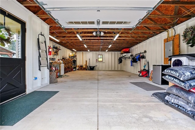 319 Ferry Ln, North-Other Area, PA 16370 - garage with electric panel and a garage door opener