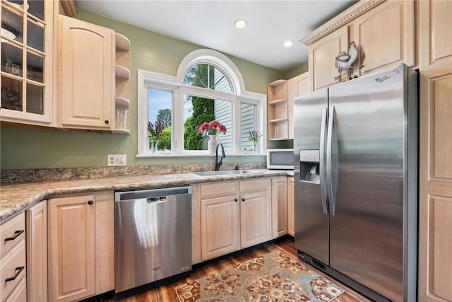203 E Main St, New Alexandria, PA 15670 - kitchen with stainless steel appliances, open shelves, a sink, light brown cabinetry, and recessed lighting