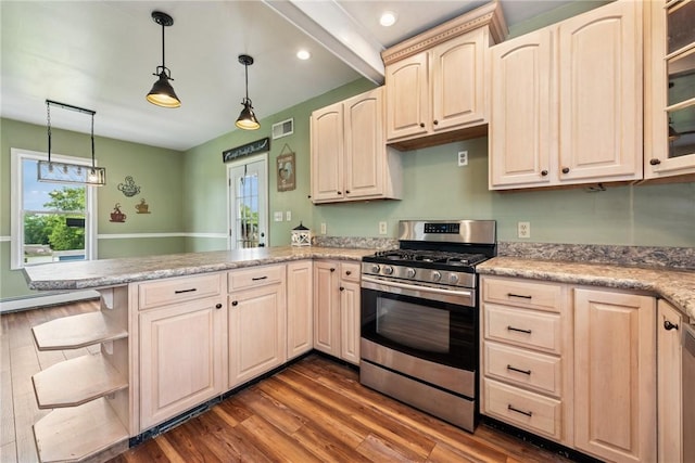 203 E Main St, New Alexandria, PA 15670 - kitchen with appliances with stainless steel finishes, a peninsula, dark wood-style floors, plenty of natural light, and recessed lighting
