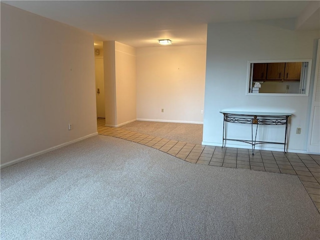 220 N Dithridge Unit 907, Oakland, PA 15213 - unfurnished living room featuring light carpet, baseboards, and light tile patterned flooring