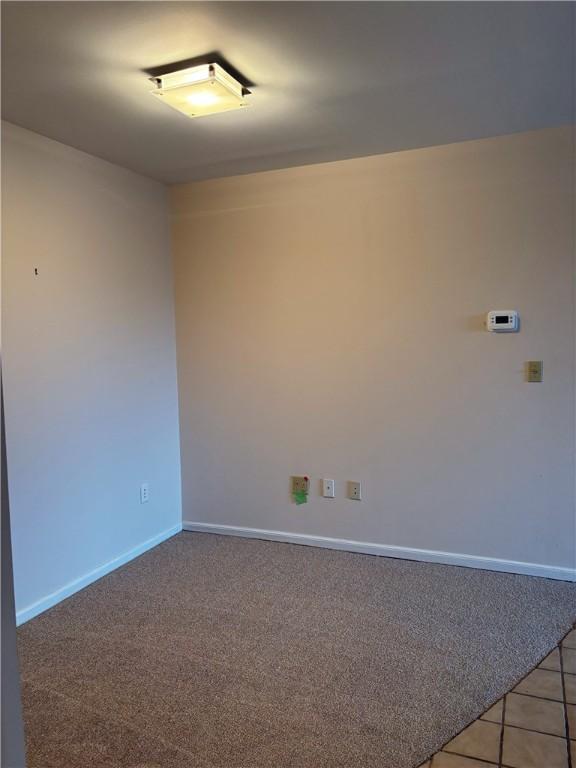 220 N Dithridge Unit 907, Oakland, PA 15213 - tiled spare room featuring baseboards