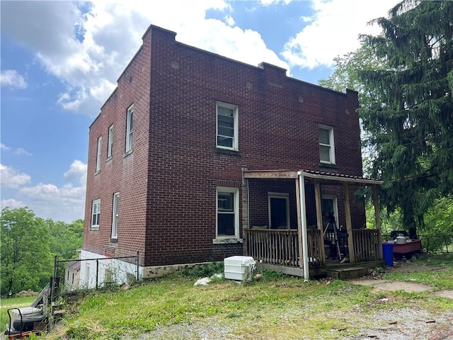 140 Smartnick Rd, Hempfield Twp Wml, PA 15601 - rear view of house with brick siding
