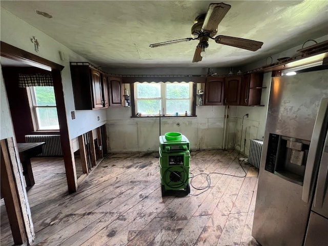 140 Smartnick Rd, Hempfield Twp Wml, PA 15601 - kitchen featuring stainless steel fridge, radiator, light wood-style flooring, and ceiling fan