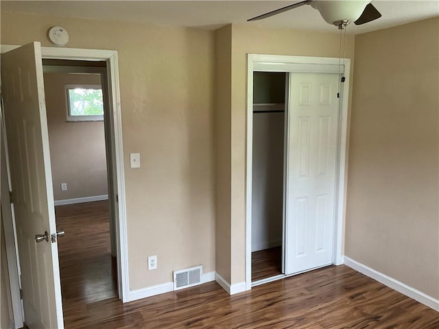 157 Suncrest Dr, Verona, PA 15147 - unfurnished bedroom featuring wood finished floors, a closet, and baseboards