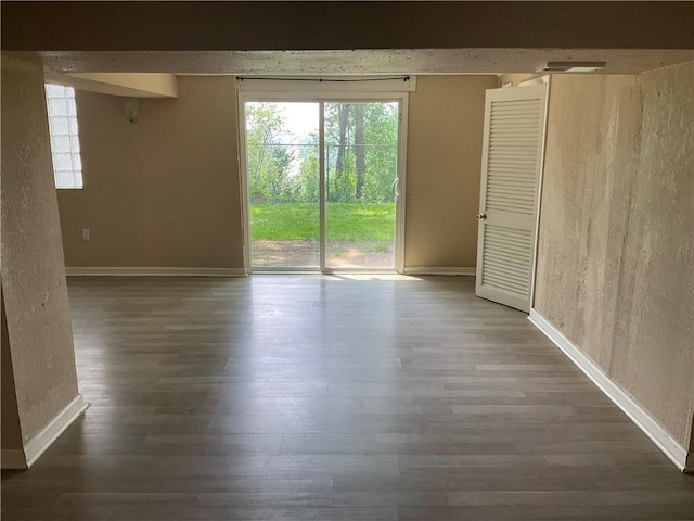157 Suncrest Dr, Verona, PA 15147 - unfurnished room featuring wood finished floors, baseboards, and a textured wall