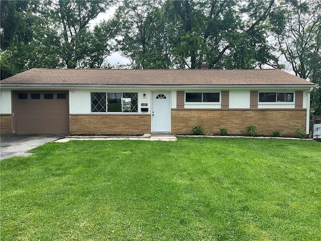 157 Suncrest Dr, Verona, PA 15147 - ranch-style home with brick siding, a garage, driveway, and a front yard
