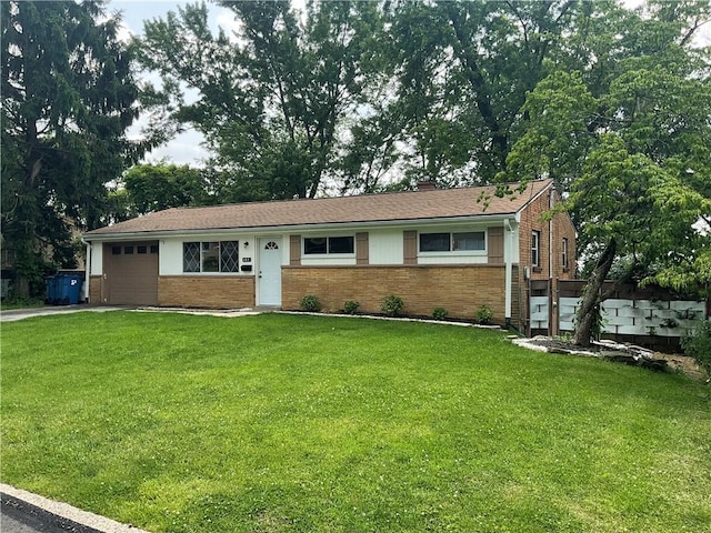 157 Suncrest Dr, Verona, PA 15147 - ranch-style house with brick siding, a garage, driveway, and a front lawn