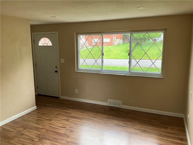 157 Suncrest Dr, Verona, PA 15147 - entrance foyer with wood finished floors and baseboards