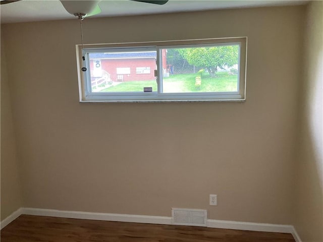 157 Suncrest Dr, Verona, PA 15147 - unfurnished room with plenty of natural light, wood finished floors, and baseboards