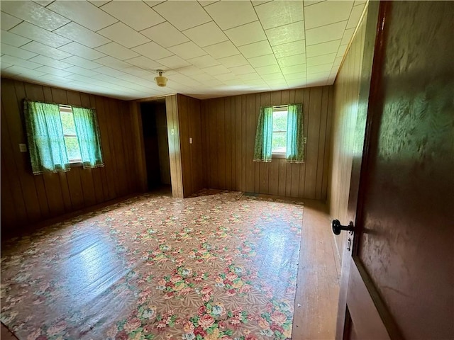 201 Cowanshannock Rd, Rayburn Twp, PA 16201 - spare room featuring wood finished floors and wood walls