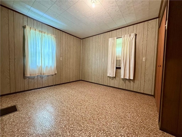 201 Cowanshannock Rd, Rayburn Twp, PA 16201 - empty room featuring wood walls and baseboards