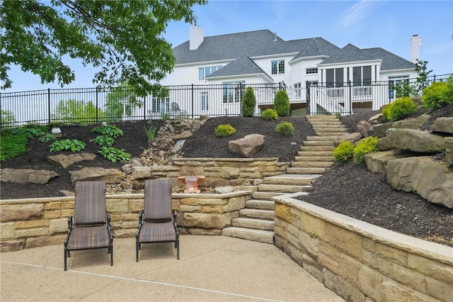 527 Salem Heights Dr, Pine Twp Nal, PA 15044 - back of house featuring stairs, a patio, a chimney, and a shingled roof
