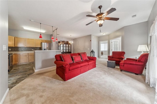 300 Hidden Ridge Ct Unit 203, South Park, PA 15129 - living area with carpet flooring, a ceiling fan, and a chandelier