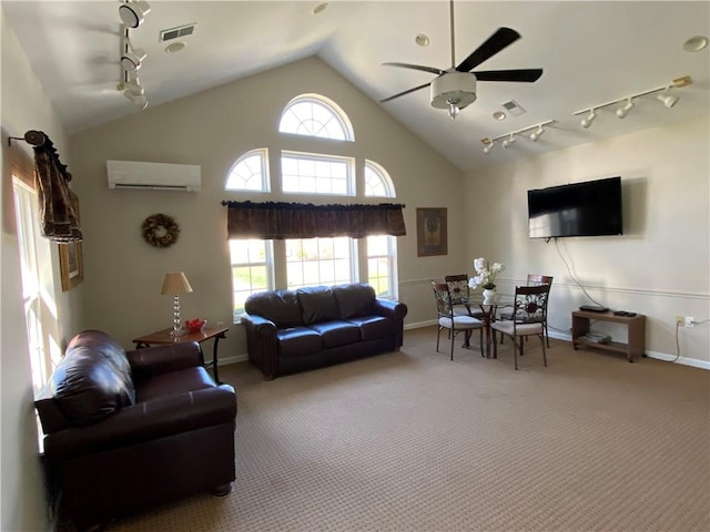 300 Hidden Ridge Ct Unit 203, South Park, PA 15129 - carpeted living room featuring rail lighting, a wall unit AC, a ceiling fan, baseboards, and high vaulted ceiling