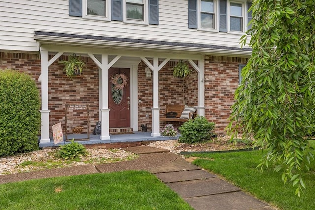 600 Buckingham Dr, Hempfield Twp, PA 15601 - entrance to property featuring a porch and brick siding