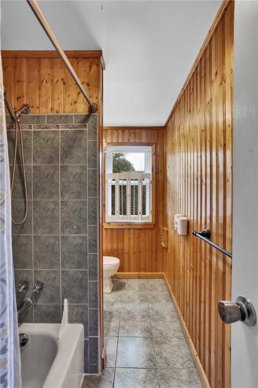 600 Buckingham Dr, Hempfield Twp, PA 15601 - bathroom with toilet, wood walls, and shower / bath combo