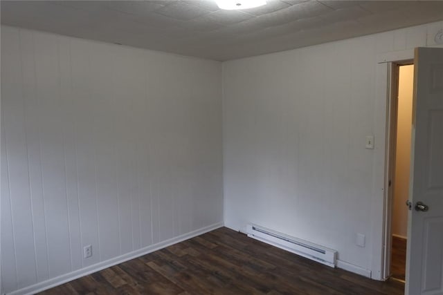 165 W Wylie Ave, City Of Washington, PA 15301 - empty room featuring a baseboard radiator and dark wood-type flooring