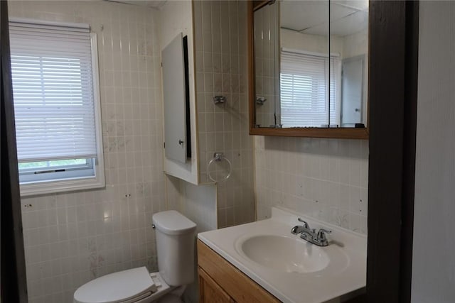 165 W Wylie Ave, City Of Washington, PA 15301 - bathroom with tile walls, toilet, and vanity