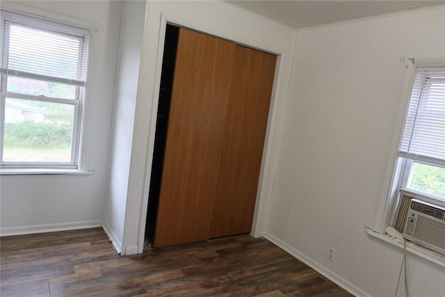 165 W Wylie Ave, City Of Washington, PA 15301 - unfurnished bedroom with a closet, dark wood-style flooring, baseboards, ornamental molding, and cooling unit