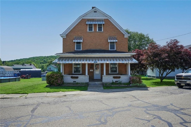320 Garfield St, W Kittanning Boro, PA 16201 - colonial inspired home with covered porch, a front lawn, and brick siding