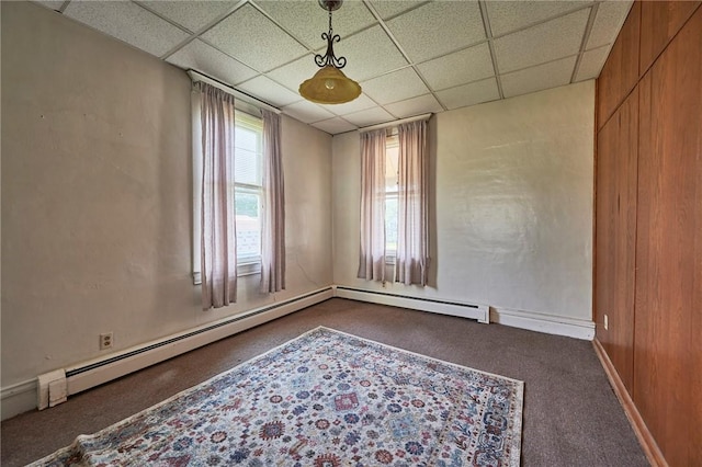 320 Garfield St, W Kittanning Boro, PA 16201 - empty room featuring dark colored carpet, a drop ceiling, baseboard heating, and baseboards