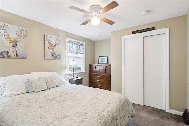 452 Clark Hollow Rd, Fairfield Twp, PA 15944 - bedroom with dark colored carpet, a closet, and ceiling fan