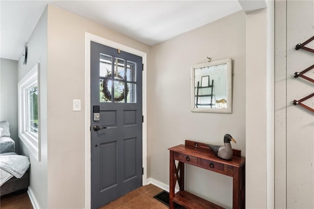452 Clark Hollow Rd, Fairfield Twp, PA 15944 - tiled entryway featuring plenty of natural light and baseboards