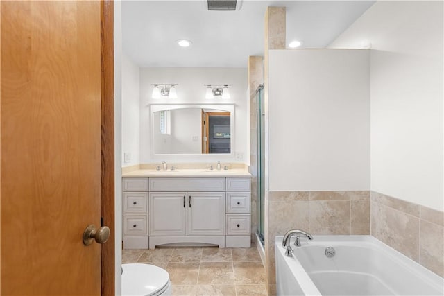 127 Craig Dr, Hempfield Twp Wml, PA 15601 - full bath featuring a bath, double vanity, a shower stall, toilet, and tile patterned floors