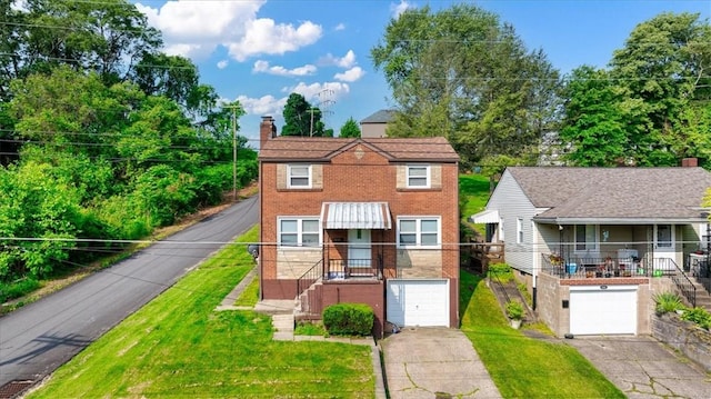 5944 Keefe St, Lincoln Place, PA 15207 - view of front of house with driveway, a garage, brick siding, and a chimney