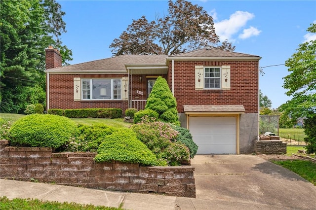 420 N St, Springdale Boro, PA 15144 - view of front of house featuring brick siding, a chimney, driveway, and an attached garage
