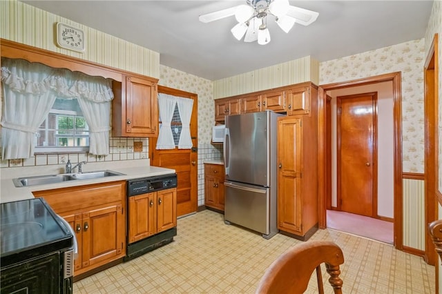 420 N St, Springdale Boro, PA 15144 - kitchen with freestanding refrigerator, wallpapered walls, dishwasher, a ceiling fan, and light countertops