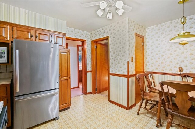 420 N St, Springdale Boro, PA 15144 - kitchen featuring freestanding refrigerator, a ceiling fan, wallpapered walls, light flooring, and white microwave