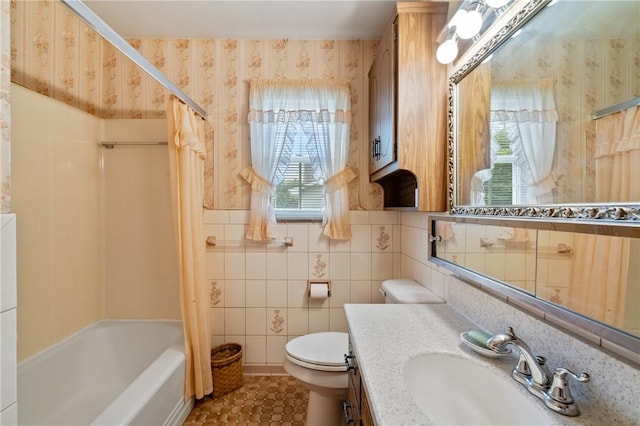 420 N St, Springdale Boro, PA 15144 - full bathroom with wallpapered walls, vanity, toilet, shower / bath combo, and tile walls