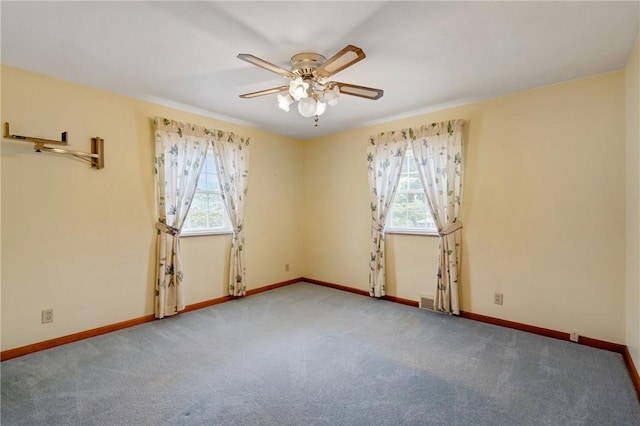 420 N St, Springdale Boro, PA 15144 - unfurnished room with healthy amount of natural light, ceiling fan, baseboards, and carpet flooring
