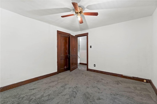 2715 Merwyn Ave, Sheraden, PA 15204 - unfurnished room with light colored carpet, baseboards, and ceiling fan