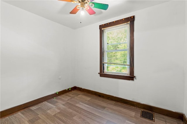 2715 Merwyn Ave, Sheraden, PA 15204 - unfurnished room featuring a ceiling fan, baseboards, and wood finished floors