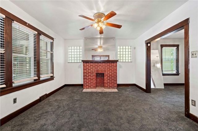 2715 Merwyn Ave, Sheraden, PA 15204 - unfurnished living room featuring dark carpet, a ceiling fan, baseboards, and a brick fireplace