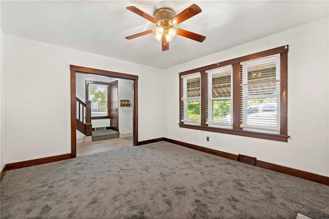 2715 Merwyn Ave, Sheraden, PA 15204 - empty room featuring carpet, baseboards, healthy amount of natural light, and ceiling fan